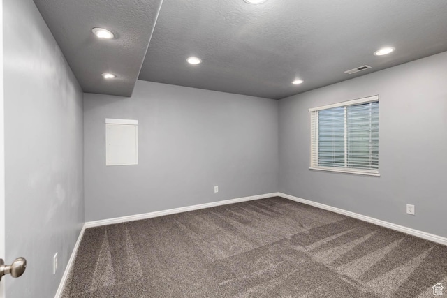 7709 N Seabiscuit Rd, Eagle Mountain, UT 84005 - empty room with carpet flooring, baseboards, recessed lighting, and a textured ceiling