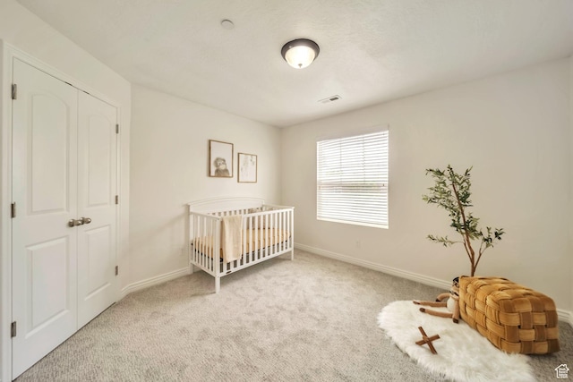 11738 S Currant Dr Unit 112, South Jordan, UT 84009 - carpeted bedroom with baseboards and a nursery area