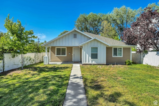 133 E Commonwealth Ave S, South Salt Lake, UT 84115 - view of front of house featuring board and batten siding, a shingled roof, and covered porch