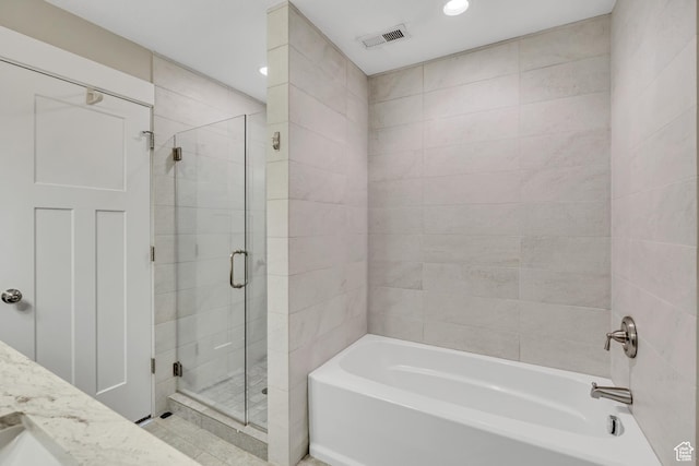 133 E Commonwealth Ave S, South Salt Lake, UT 84115 - full bath featuring a stall shower, a bath, recessed lighting, and vanity