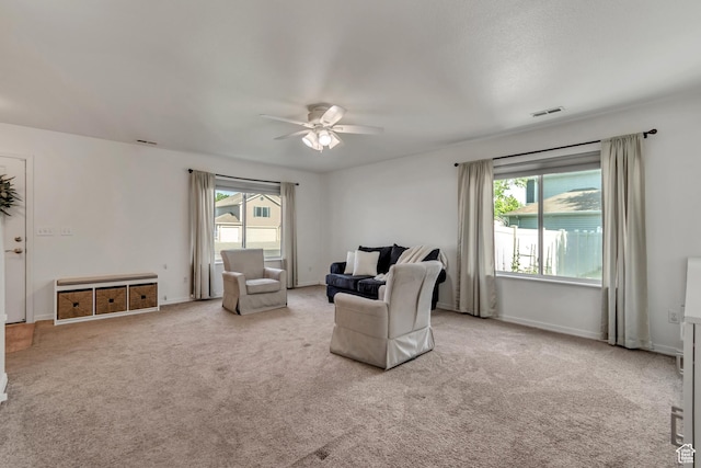 856 S 1580 W, Lehi, UT 84043 - carpeted living area with a ceiling fan, plenty of natural light, and baseboards