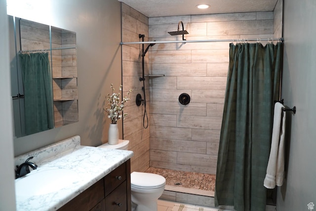 115 W 200 S, Wales, UT 84667 - bathroom featuring toilet, vanity, and tiled shower