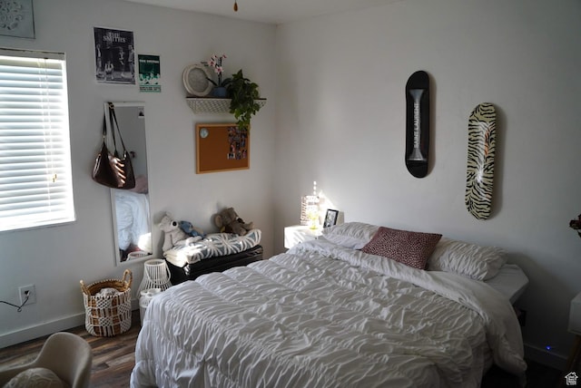 115 W 200 S, Wales, UT 84667 - bedroom with wood finished floors, multiple windows, and baseboards
