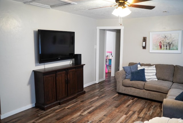115 W 200 S, Wales, UT 84667 - living room with dark wood-style floors, ceiling fan, and baseboards