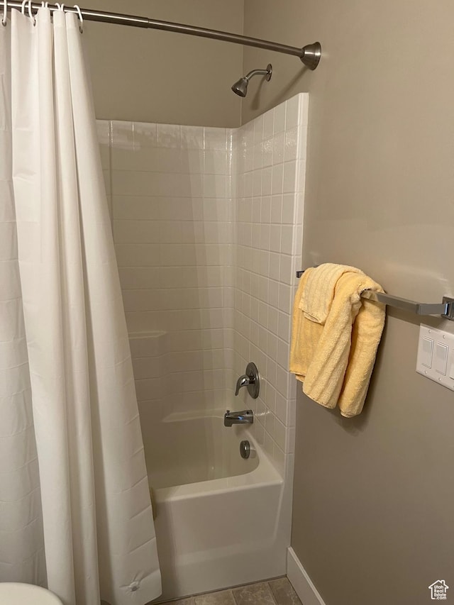 9681 S Zakro Ln, South Jordan, UT 84095 - bathroom featuring shower / tub combo and baseboards
