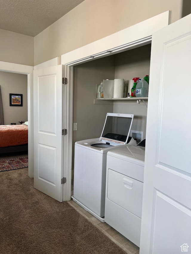9681 S Zakro Ln, South Jordan, UT 84095 - laundry room featuring washer and clothes dryer and light colored carpet