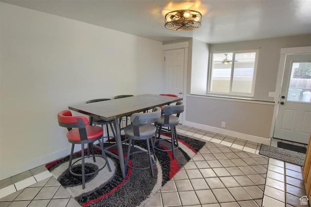 3600 S 6580 W, West Valley City, UT 84128 - dining room with light tile patterned floors and baseboards