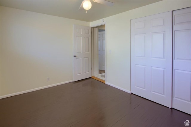 3600 S 6580 W, West Valley City, UT 84128 - unfurnished bedroom featuring baseboards, wood finished floors, a closet, and ceiling fan