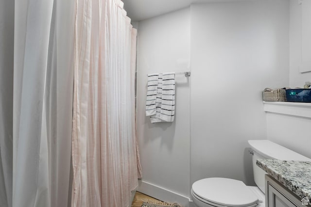 480 S 1160 W, Orem, UT 84058 - bathroom featuring toilet, vanity, curtained shower, and baseboards