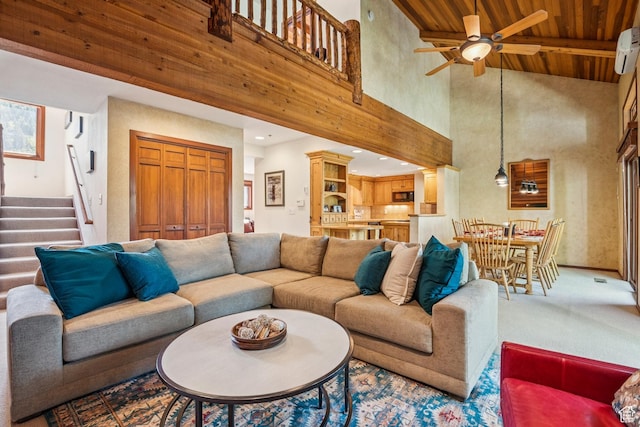 1709 Lakeside Cir, Park City, UT 84060 - carpeted living room featuring wooden ceiling with exposed beams, a ceiling fan, stairs, high vaulted ceiling, and a wall mounted AC