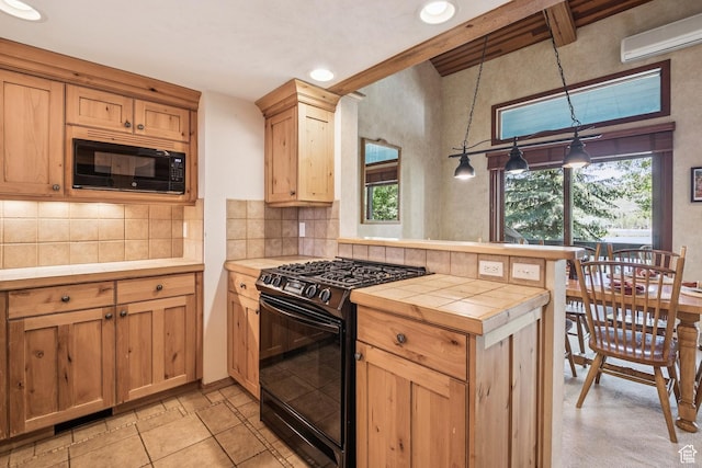 1709 Lakeside Cir, Park City, UT 84060 - kitchen with black appliances, a peninsula, a wall unit AC, tile counters, and tasteful backsplash