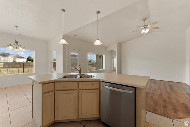 4236 N 2375 W, Cedar City, UT 84721 - kitchen with stainless steel dishwasher, a sink, arched walkways, light countertops, and light tile patterned flooring