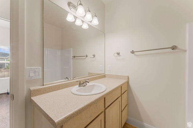 4236 N 2375 W, Cedar City, UT 84721 - bathroom featuring vanity, baseboards, and a shower