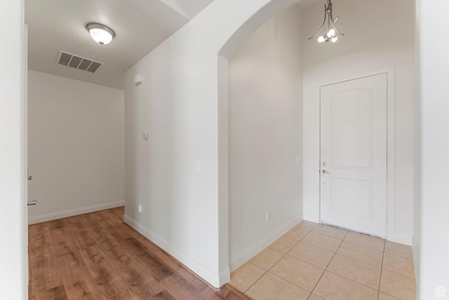 4236 N 2375 W, Cedar City, UT 84721 - hallway with arched walkways, baseboards, and light wood-style flooring