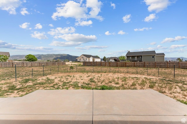 4236 N 2375 W, Cedar City, UT 84721 - view of yard featuring a patio, a mountain view, and a view of rural / pastoral area