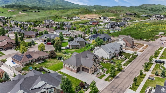 6035 Hidden Valley Rd, Mountain Green, UT 84050 - aerial perspective of suburban area with a mountain backdrop