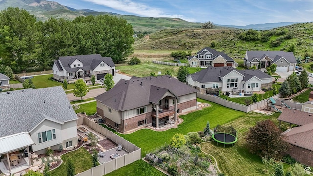 6035 Hidden Valley Rd, Mountain Green, UT 84050 - aerial perspective of suburban area with a mountain backdrop