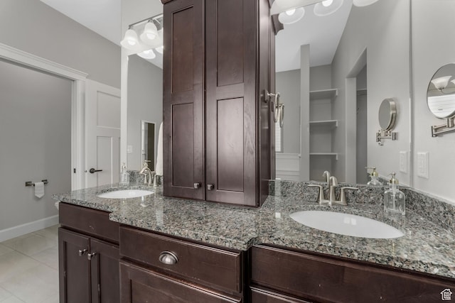 6035 Hidden Valley Rd, Mountain Green, UT 84050 - bathroom featuring double vanity and tile patterned floors