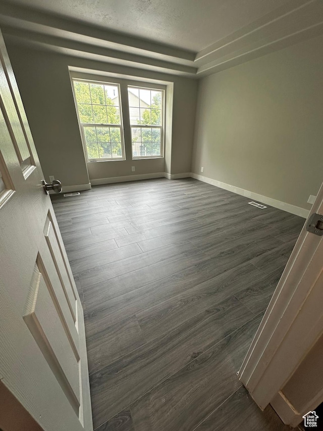 39 W 1930 N, Tooele, UT 84074 - spare room with dark wood-style floors and baseboards