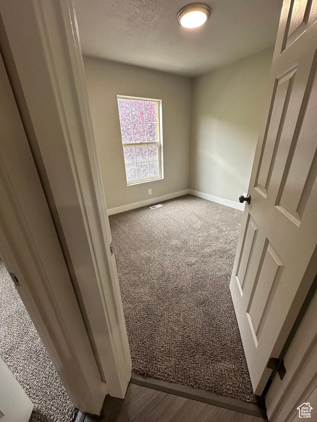 39 W 1930 N, Tooele, UT 84074 - spare room featuring dark carpet and baseboards