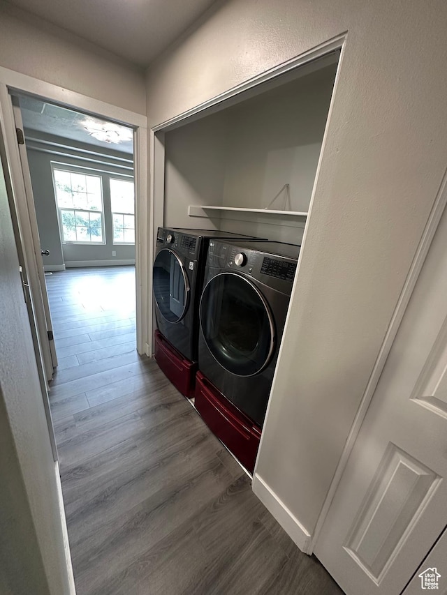 39 W 1930 N, Tooele, UT 84074 - washroom with washer and clothes dryer, wood finished floors, and baseboards