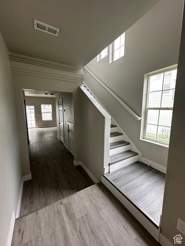 39 W 1930 N, Tooele, UT 84074 - hall featuring wood finished floors, baseboards, and stairway