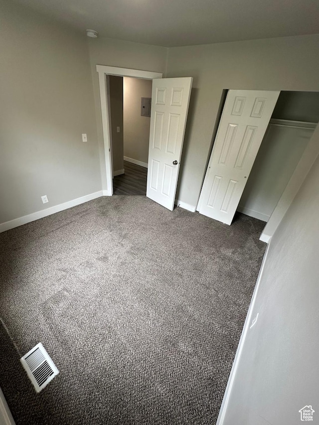 39 W 1930 N, Tooele, UT 84074 - unfurnished bedroom with carpet floors, baseboards, and a closet
