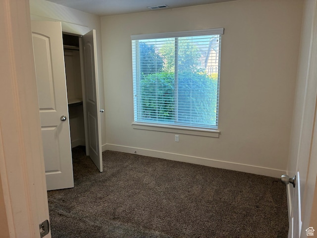 1045 S 1700 W Unit 912, Payson, UT 84651 - unfurnished bedroom with dark carpet and multiple windows
