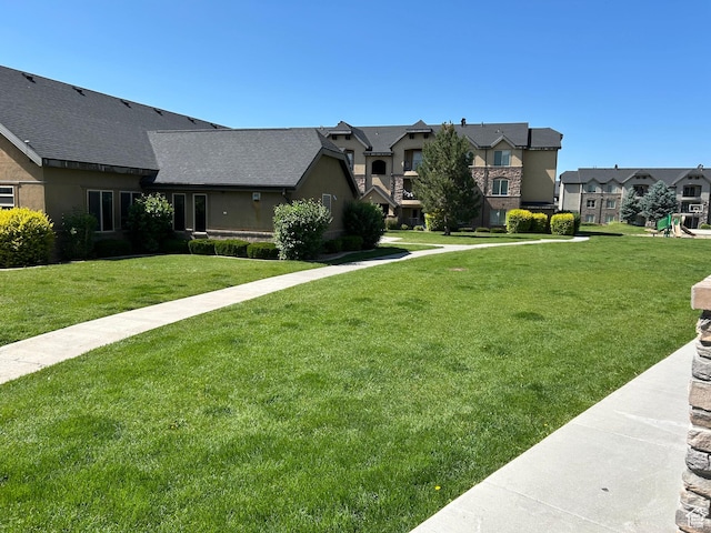 1045 S 1700 W Unit 912, Payson, UT 84651 - view of front of house with a front lawn and a residential view