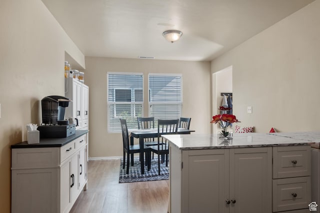 1722 N 80 E, Tooele, UT 84074 - dining space with light wood finished floors and baseboards