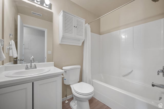 1722 N 80 E, Tooele, UT 84074 - full bath with toilet, shower / tub combo with curtain, vanity, and wood finished floors