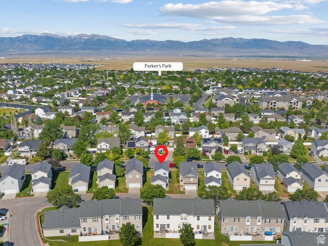 1722 N 80 E, Tooele, UT 84074 - aerial perspective of suburban area featuring a mountainous background