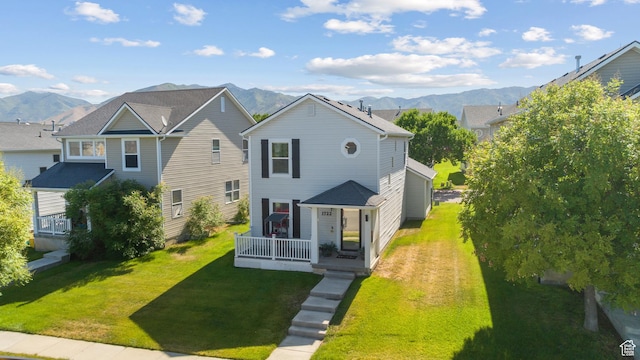 1722 N 80 E, Tooele, UT 84074 - view of front facade featuring a front yard and a mountain view