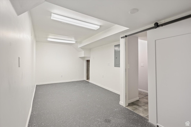 10865 S Granite Dr, Sandy, UT 84094 - finished below grade area with baseboards, electric panel, and a barn door