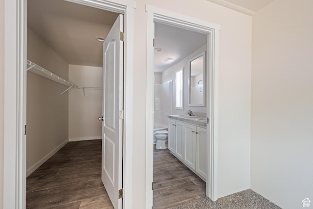30 N 100 W, Parowan, UT 84761 - full bathroom with vanity, toilet, wood finished floors, and a walk in closet