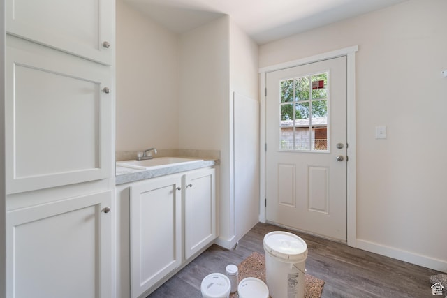 30 N 100 W, Parowan, UT 84761 - entryway featuring wood finished floors, a sink, and baseboards