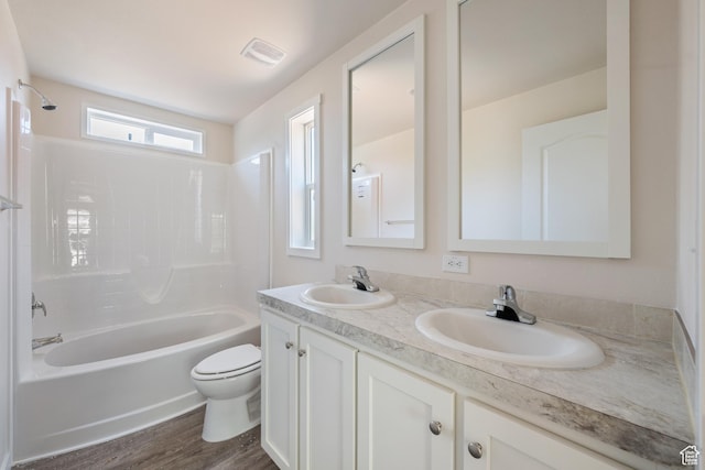 30 N 100 W, Parowan, UT 84761 - bathroom with toilet, double vanity, shower / bathtub combination, and wood finished floors