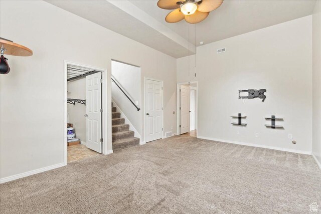 2167 E Eagle Chase Dr, Draper Ut Cnty, UT 84020 - empty room featuring carpet, ceiling fan, stairway, and baseboards