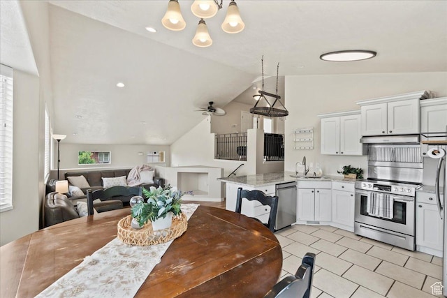 2167 E Eagle Chase Dr, Draper Ut Cnty, UT 84020 - dining area with lofted ceiling, a chandelier, light tile patterned floors, and ceiling fan