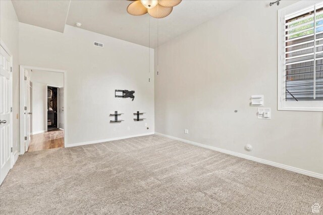 2167 E Eagle Chase Dr, Draper Ut Cnty, UT 84020 - carpeted spare room featuring a ceiling fan and baseboards