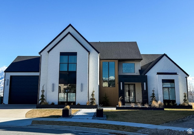 9671 N Belle St Unit 813, Eagle Mountain, UT 84005 - modern farmhouse with brick siding, driveway, an attached garage, and a shingled roof