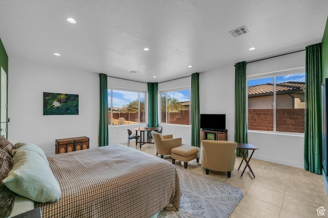 1226 W Province Way, St George, UT 84770 - bedroom with light tile patterned floors, recessed lighting, and baseboards