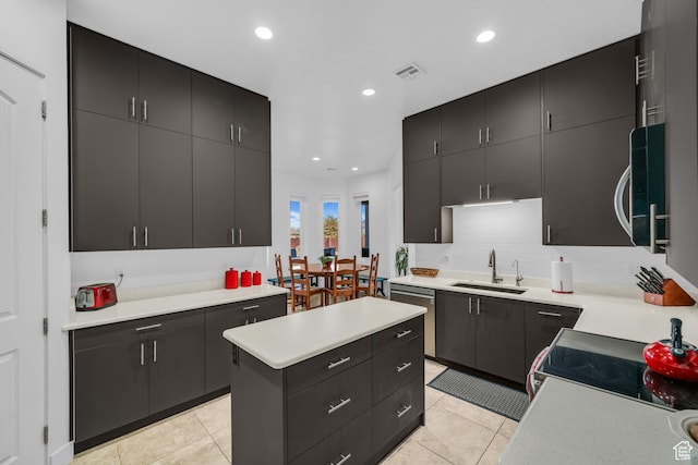 1226 W Province Way, St George, UT 84770 - kitchen with a sink, stainless steel appliances, dark cabinets, and recessed lighting