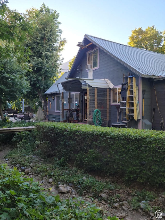 83 E Miners St, Ophir, UT 84071 - rear view of house with metal roof and cooling unit