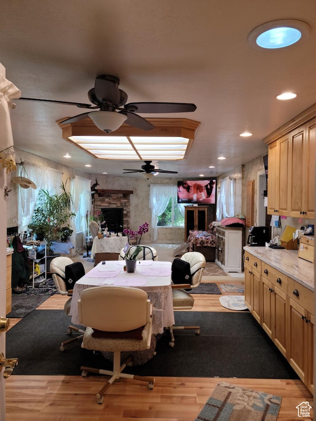 83 E Miners St, Ophir, UT 84071 - dining area with a fireplace, ceiling fan, light wood-style flooring, and recessed lighting