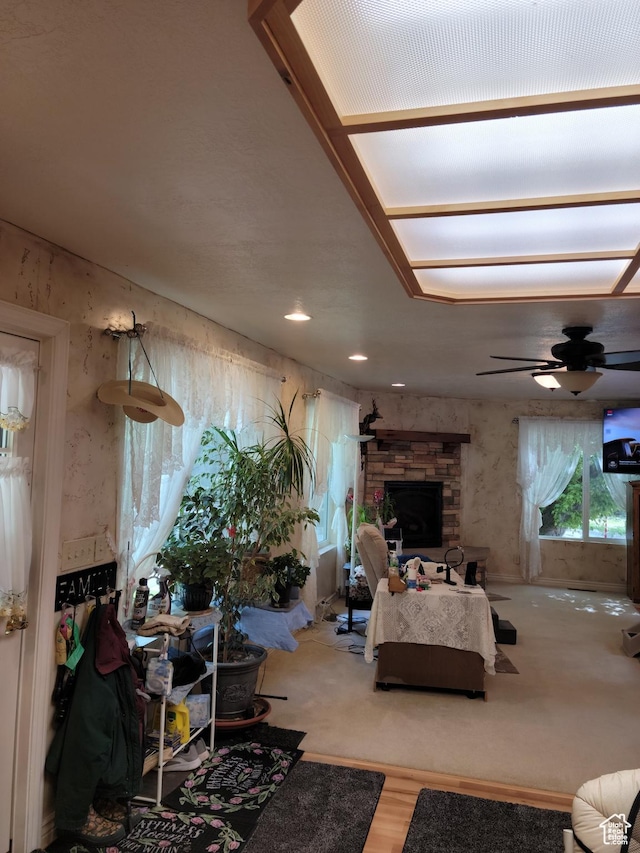 83 E Miners St, Ophir, UT 84071 - living area with ceiling fan, a fireplace, and wood finished floors