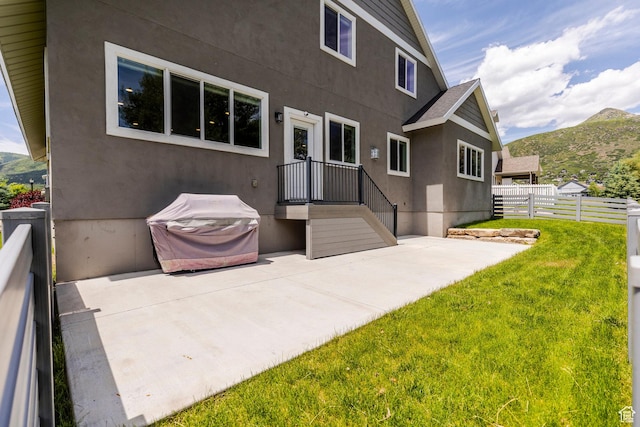 1232 Canyon Rd, Midway, UT 84049 - rear view of property with a patio area, a mountain view, and stucco siding