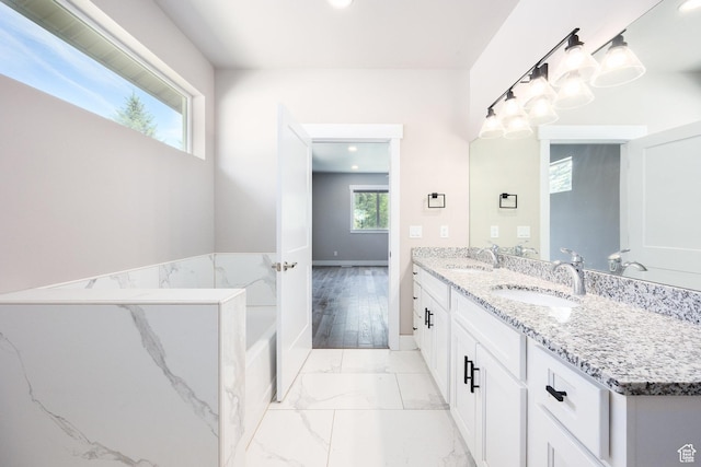 1232 Canyon Rd, Midway, UT 84049 - bathroom featuring double vanity, marble finish floors, a tub, baseboards, and recessed lighting