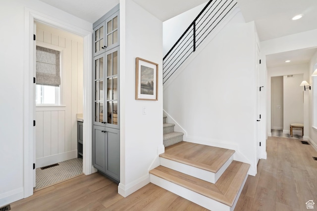11214 S Easy Bee Rd, South Jordan, UT 84009 - stairway featuring wood finished floors, baseboards, and recessed lighting
