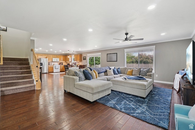 469 S Olive Way, Lehi, UT 84043 - living room featuring stairs, crown molding, a ceiling fan, dark wood-style flooring, and recessed lighting